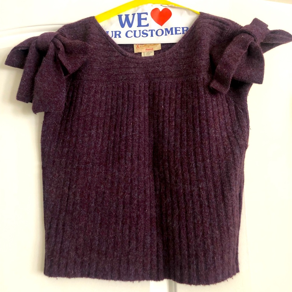 Pierrot short sleeve sweater with over sized shoulder bow detail!